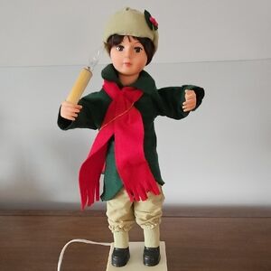 Annimated Green and Red Holiday Drummer Doll